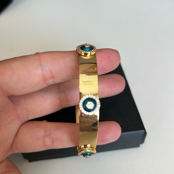Elegant Gold Bangle with Blue Accents - Picture 5 of 6